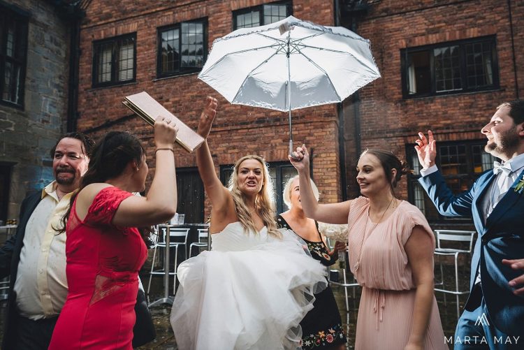 Herefordshire wedding photographers Brinsop Court rain