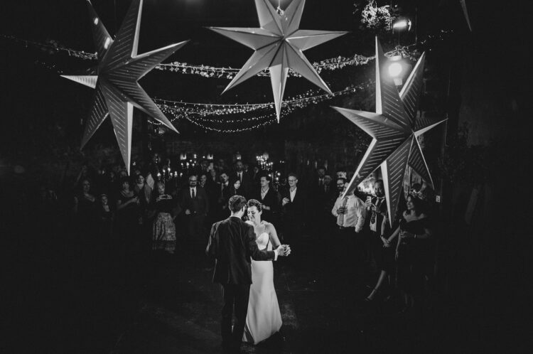 bride and groom having their first dance at Lyde Court