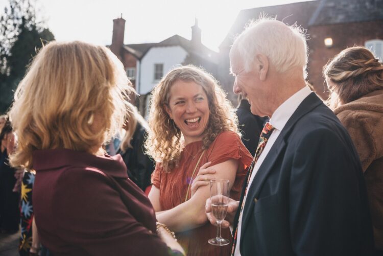 reception drinks and guests having fun at Lyde Court