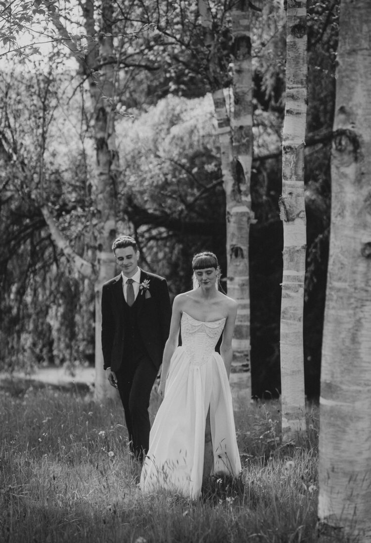 bride and groom in the silver birches at Brobury House weddings