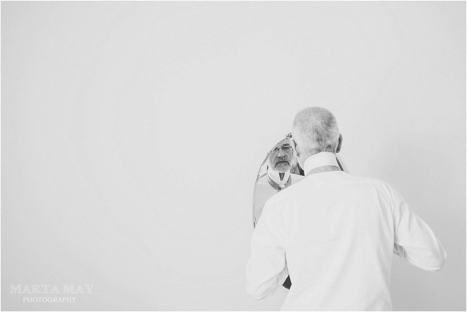 bride's dad getting ready