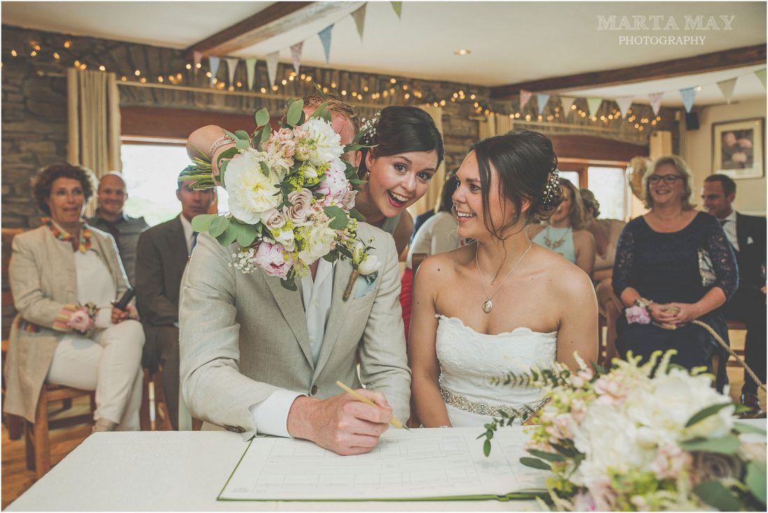 signing of the register, Black Mountain Lodge wedding photography
