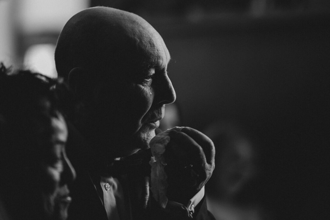 father of the bride getting emotional during the wedding ceremony at Birtsmorton Court