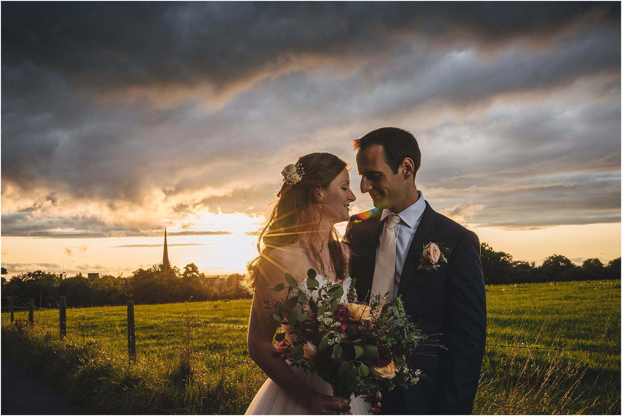 bride and groom sunset