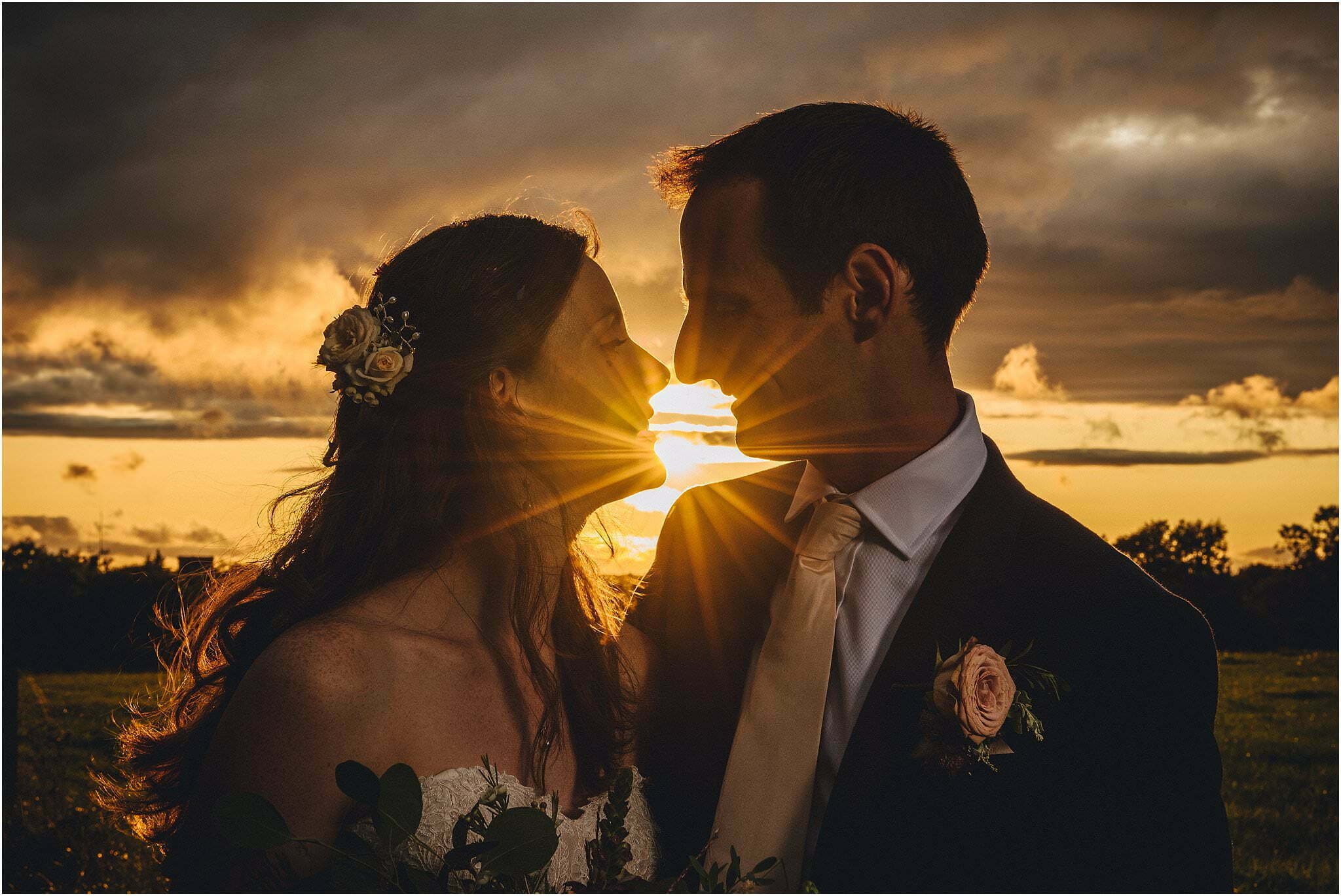 bride and groom sunset