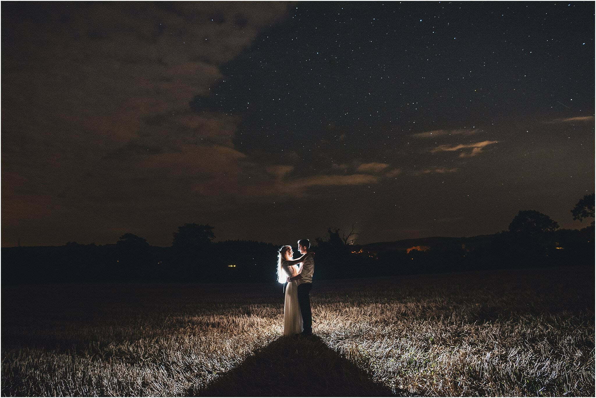 night portrait of bride and groom