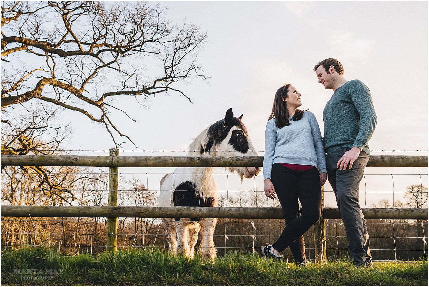 couple and horses