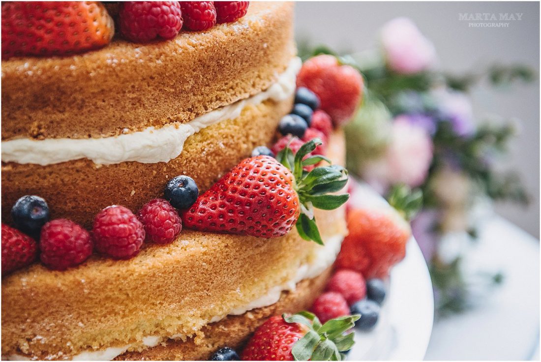 Mill Barns wedding photography wedding cake with strawberries