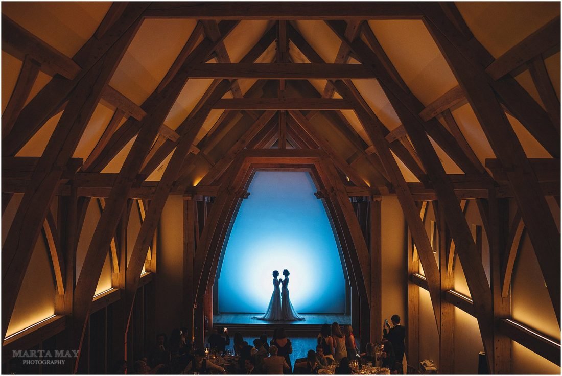 Mill Barns wedding photography silhouette of two brides holding hands