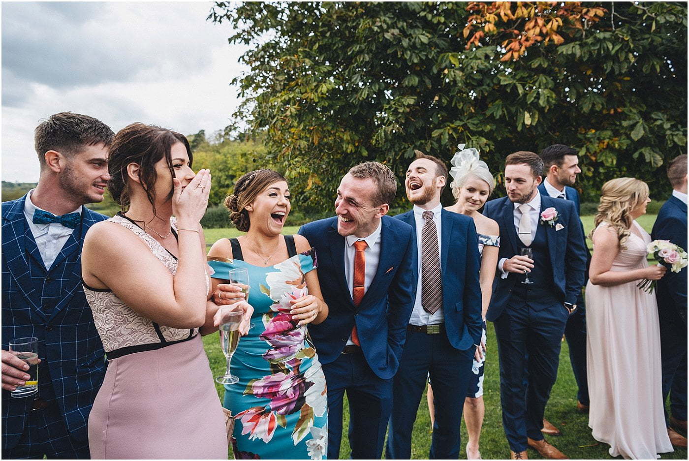 wedding guests laughing