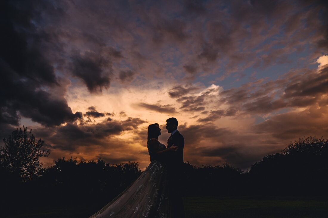 redhouse barn bride and groom shoot in the golden hour