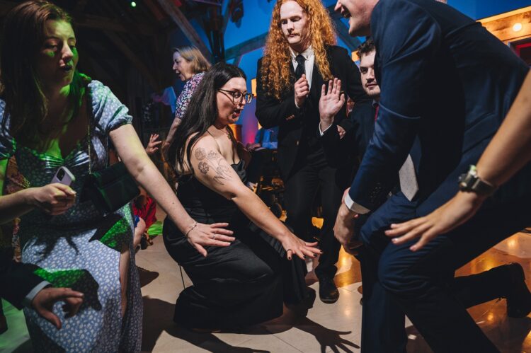 wedding guests dancing at Redhouse barn