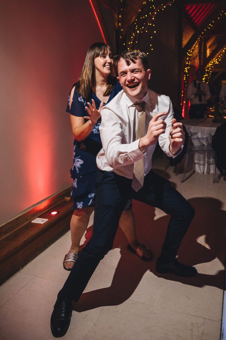 wedding guests dancing at Redhouse barn