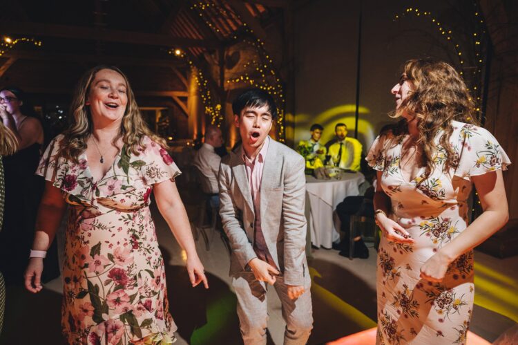 wedding guests dancing at Redhouse barn