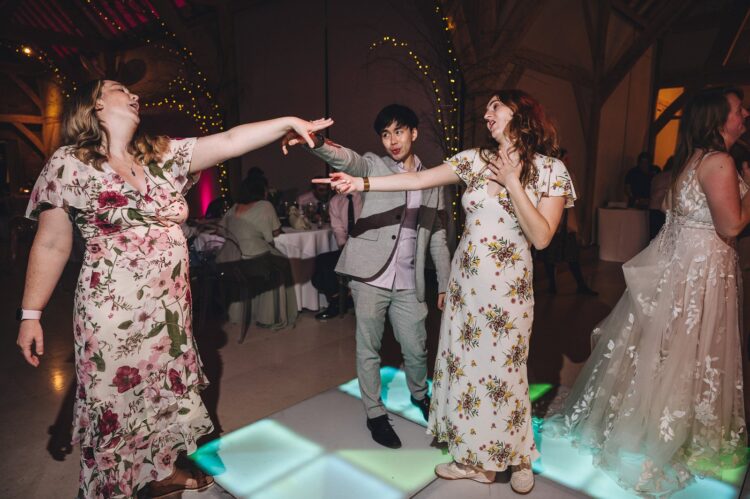 wedding guests dancing at Redhouse barn