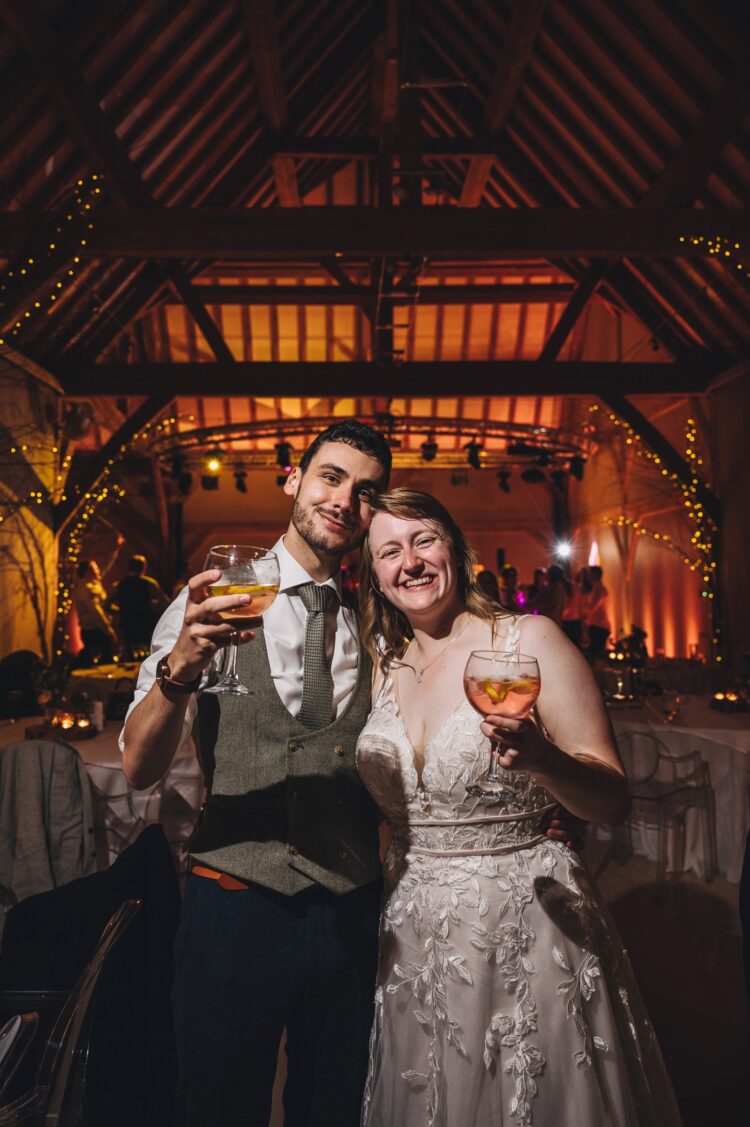 bride and groom enjoying the evening at Redhouse Barn