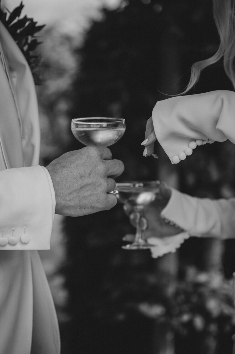bride and groom having reception drinks at Pauntley COurt