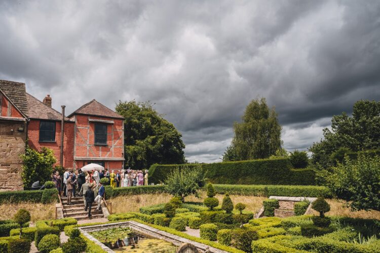reception drinks and music in the gardens at Pauntley Court Gloucestershire