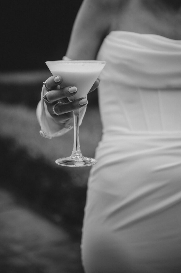 bride having a great time during reception drinks at Pauntley court gloucestershire