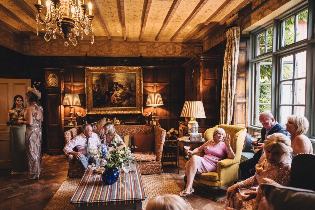 wedding guests having a great time during reception drinks at Pauntley court gloucestershire wedding photographer