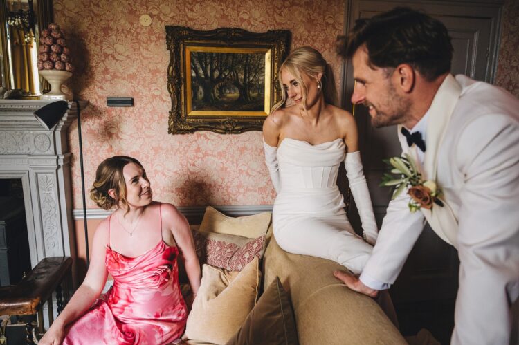 bride groom and wedding guests having a great time during reception drinks at Pauntley court gloucestershire