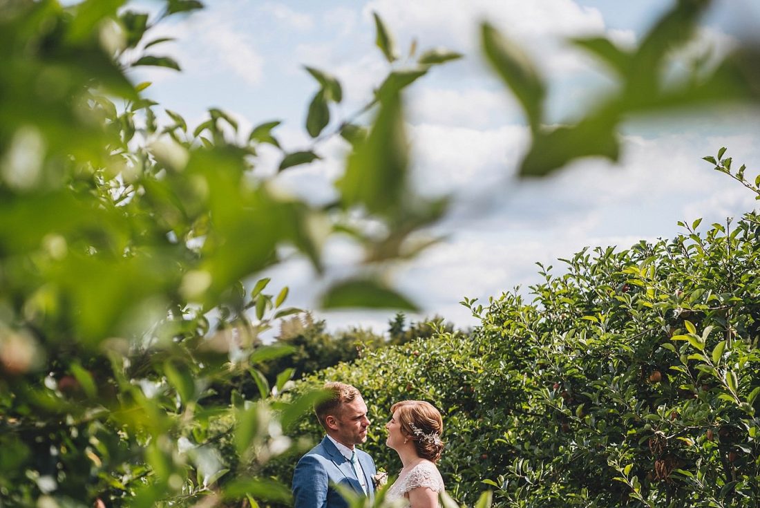 Bride and groom in vineyard