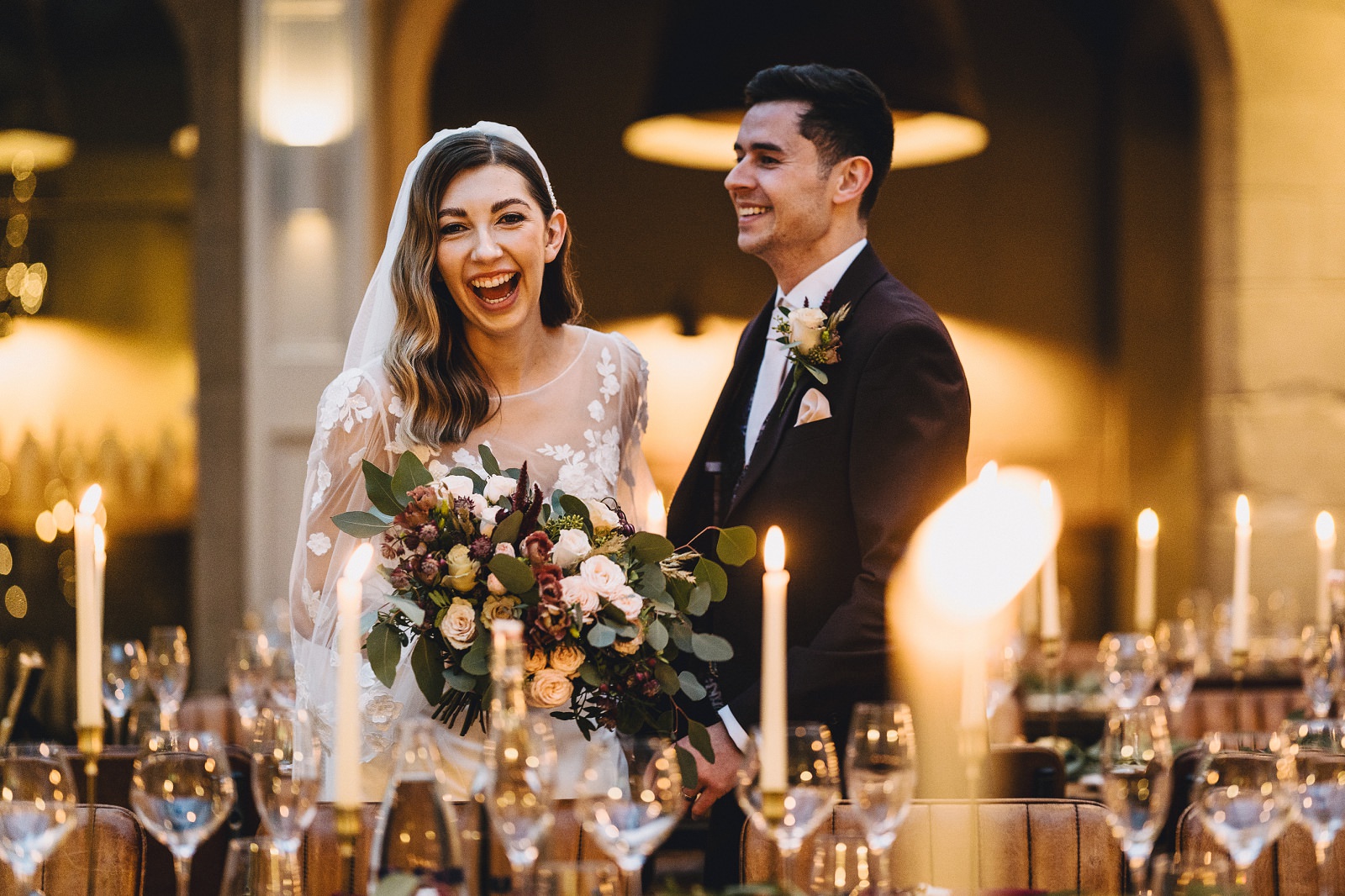 bride and groom having fun at hampton manor