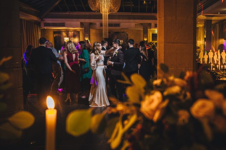 bride and groom having fun at hampton manor