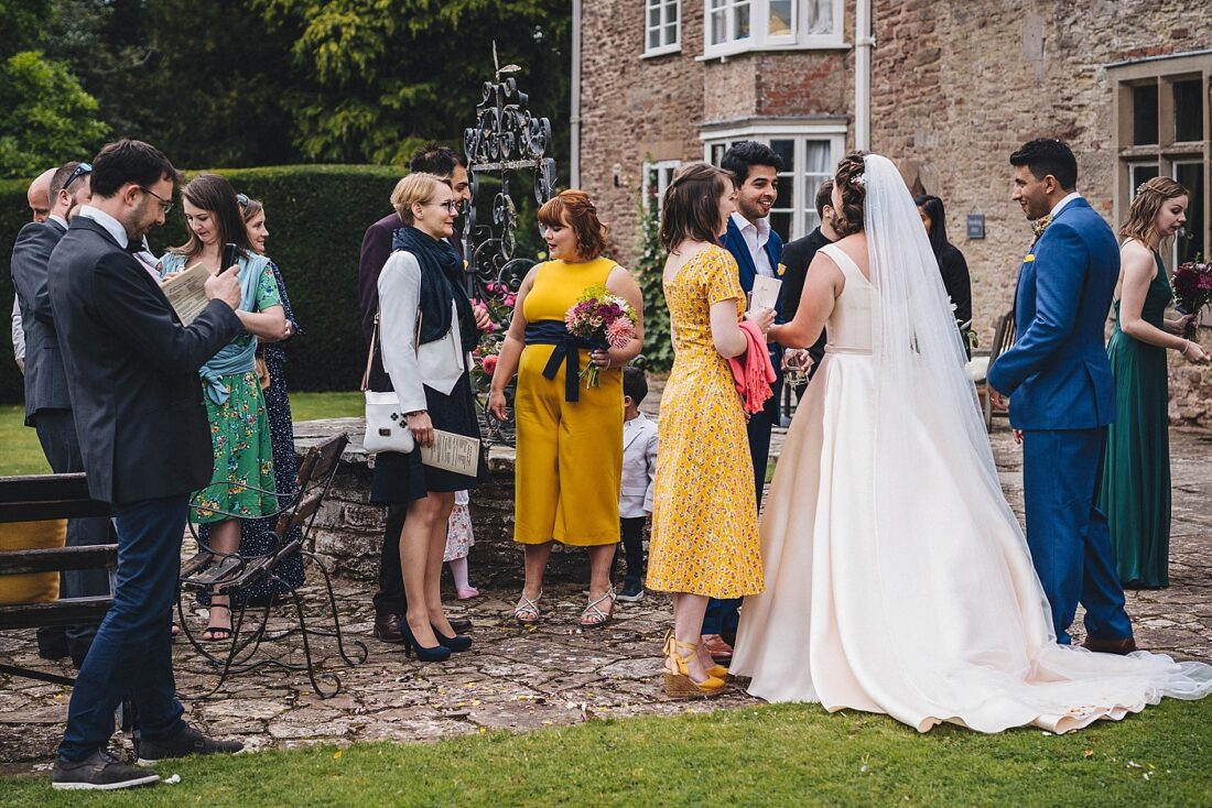 bride grom and their guests enjoying the reception drinks at Broadfield Court