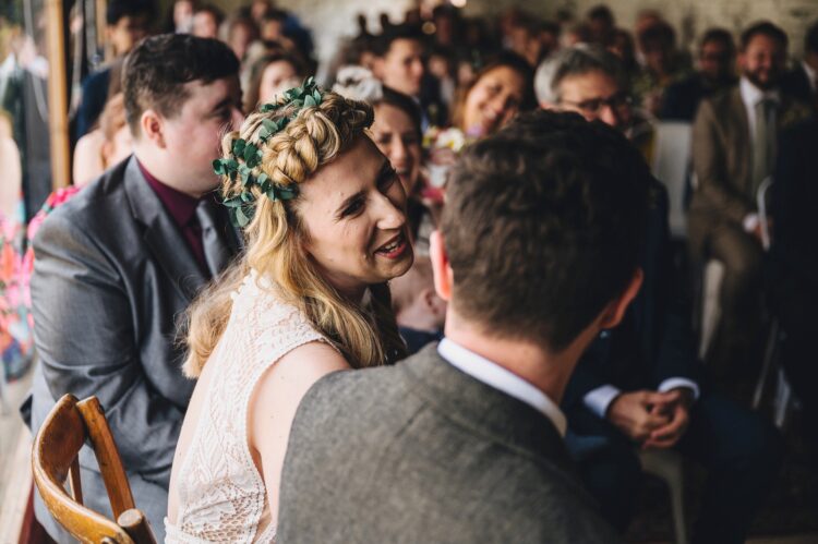 bride looking at groom during ceremony