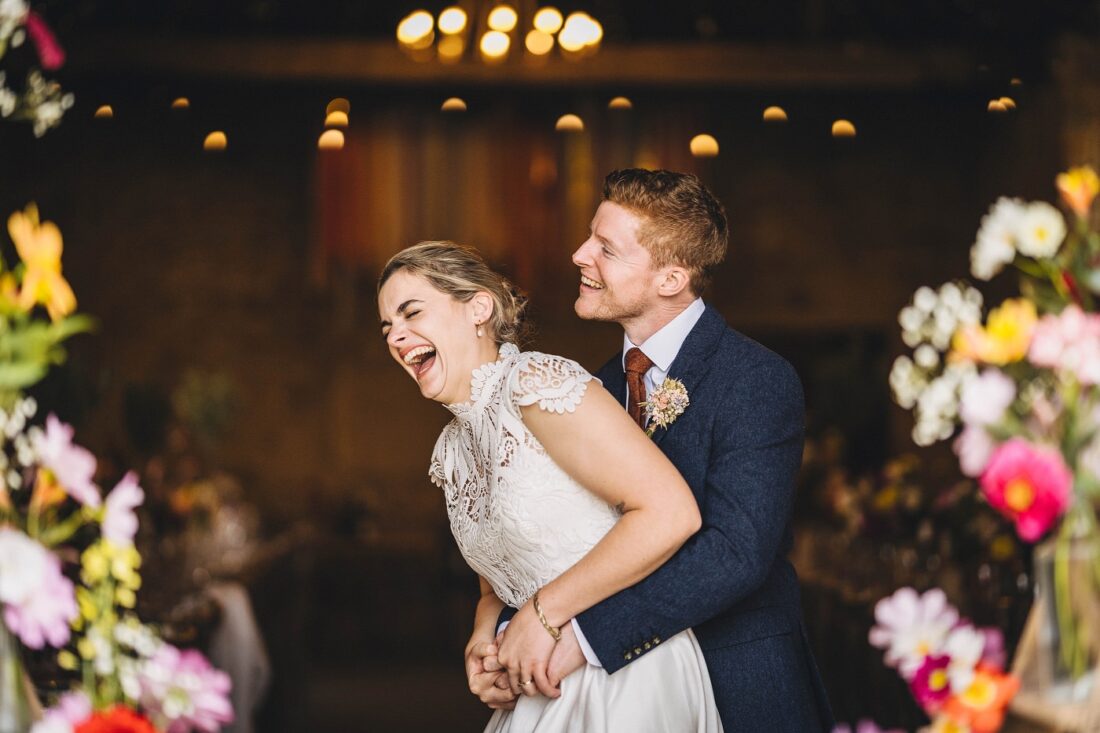 just married couple having the best time at Dillington Estate barn, Somerset wedding venues