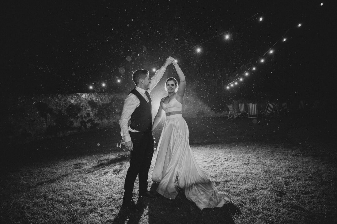 Dillington Estate wedding photography, couple dancing in the rain, somerset wedding photographer
