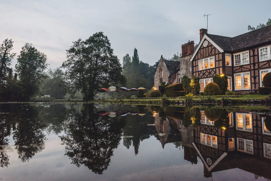 A moat at Brrinsop Court misty evening, romantic wedding venue