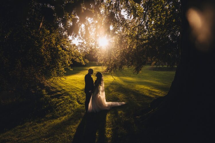 bride and groom photos in the golden hour at Bredenbury Court barns