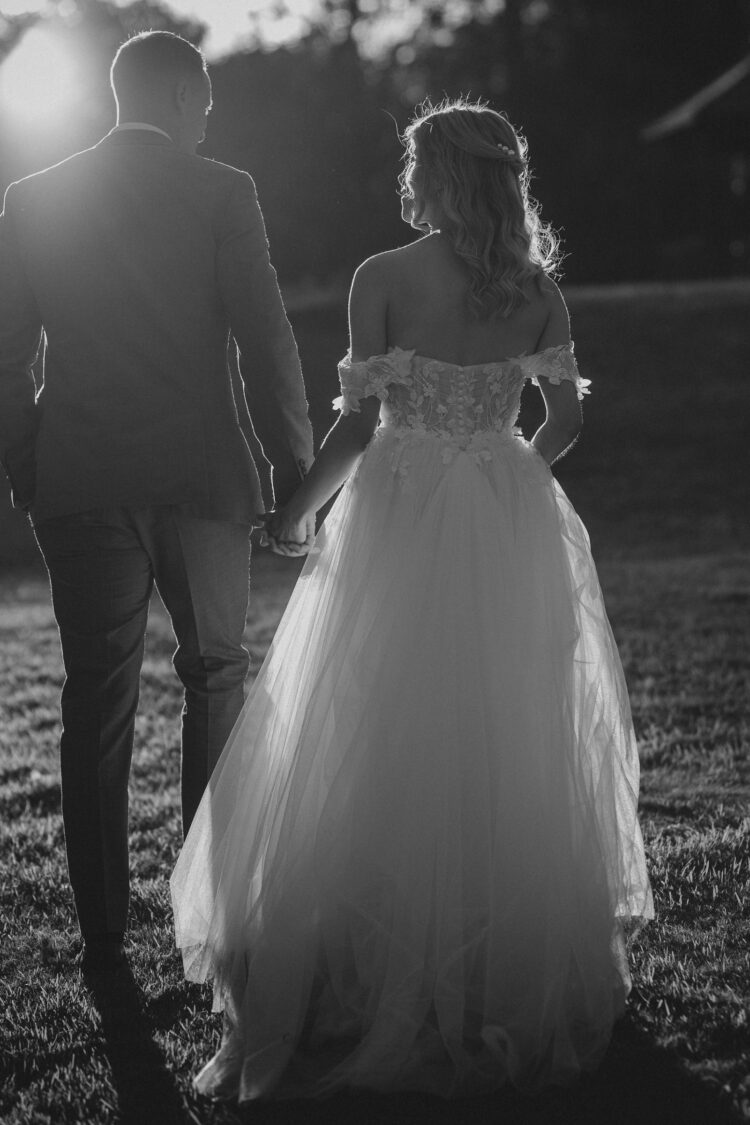 bride and groom photos in the golden hour at Bredenbury Court barns