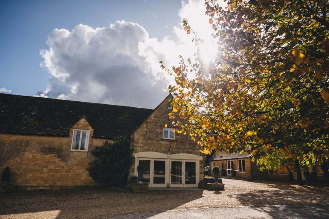 Main entrance to Lapstone Barn wedding venue in the autumn light