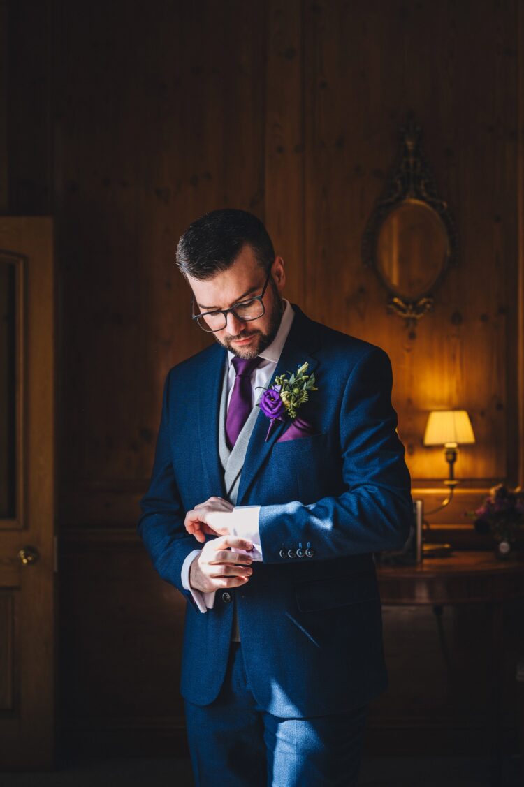 groom getting ready at Brockencote Hall