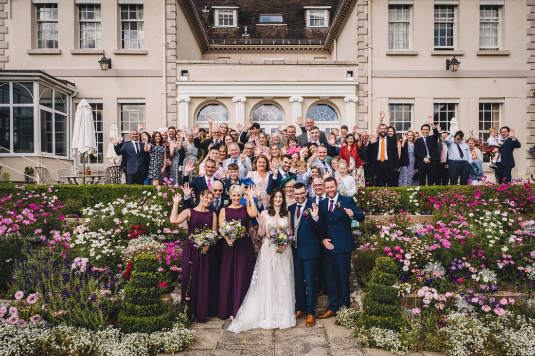 group picture of all guests at the back of Brockencote Hall