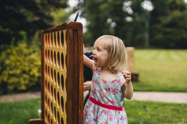 garden games during reception drinks at Brockencote Hall