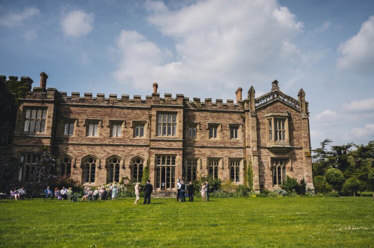 wedding guests mingling at Hampton Court Castle