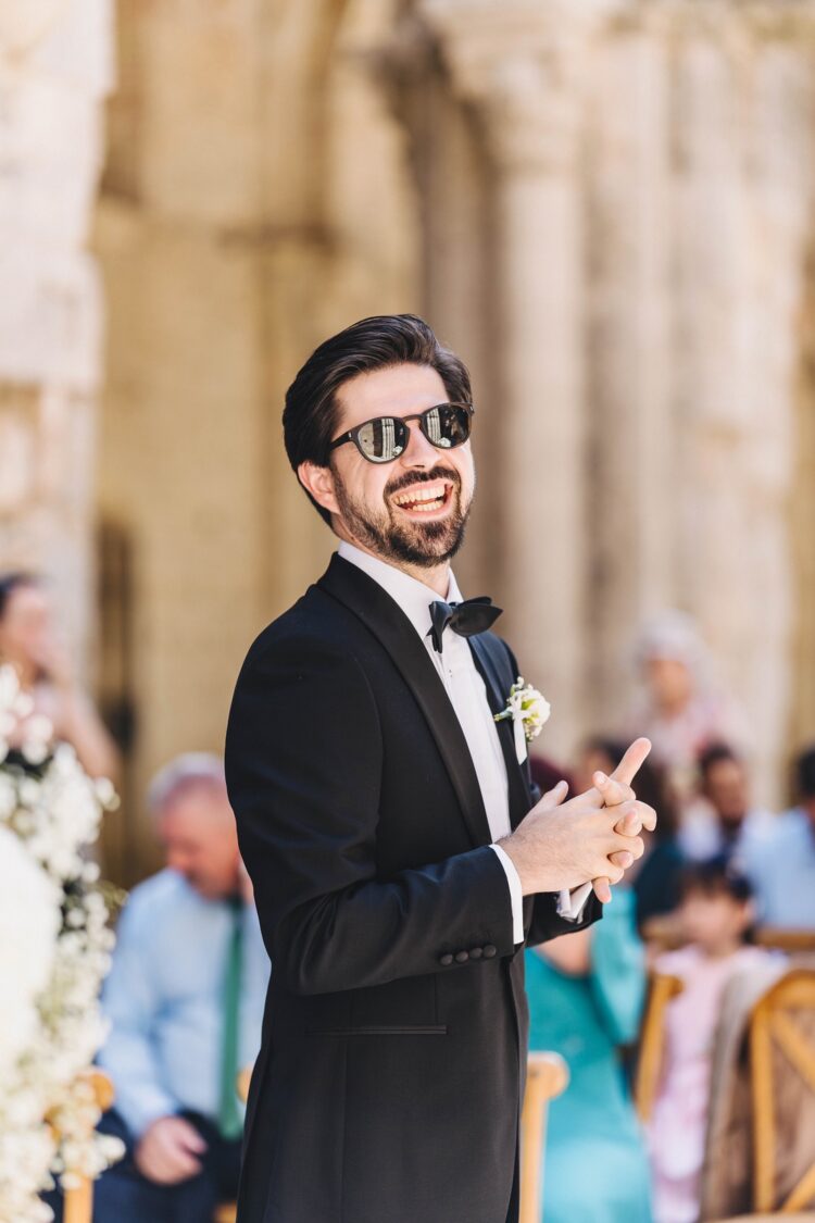 groom waiting before the ceremony at San Galgano, Tuscany