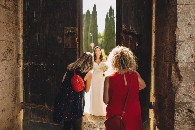 bride entering ceremony at San Galgano, Tuscany