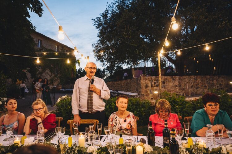 alfresco wedding speeches at Villa Podernovo Tuscany