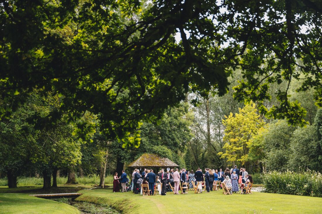 Water's Edge Ewen wedding photography guests mingling