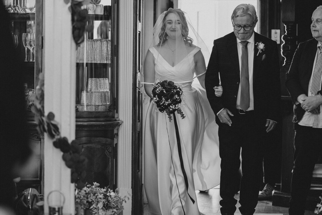bride enters the ceremony room at Berwick Lodge