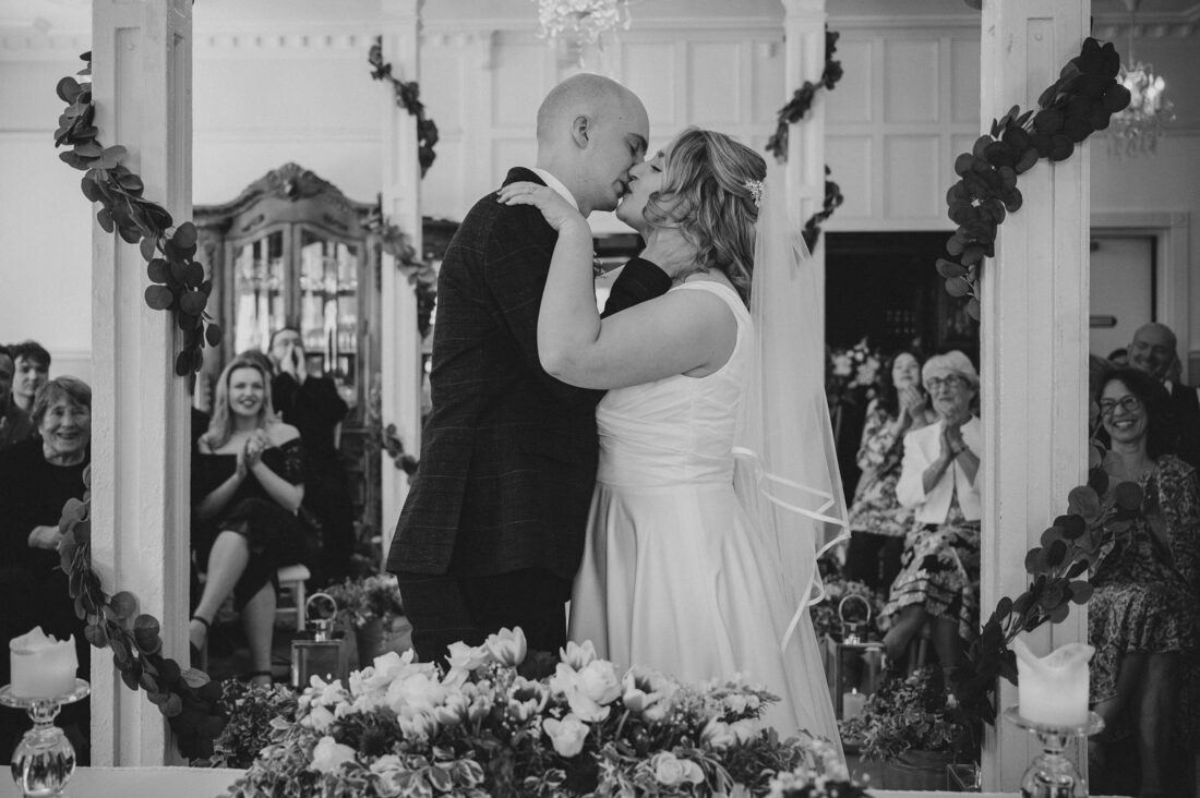 first kiss during wedding ceremony at Berwick Lodge