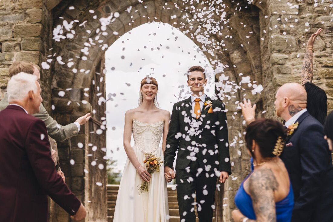 Hay castle wedding photography - confetti moment