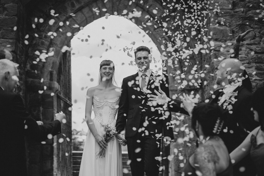 Hay castle wedding photography - confetti moment