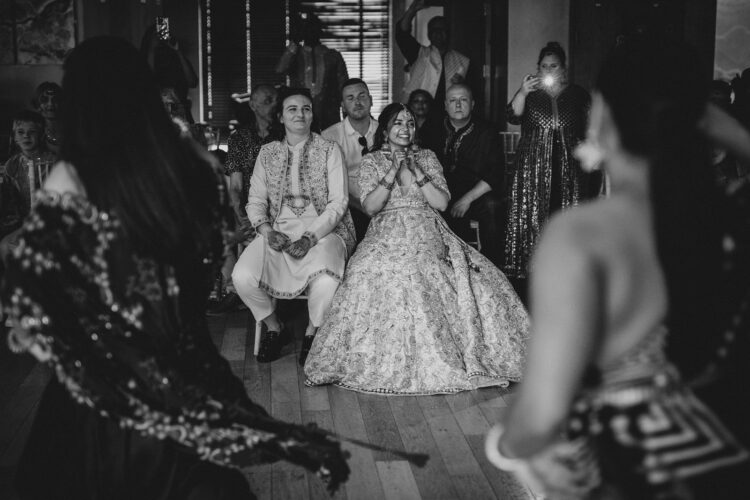 LGBTQ wedding photographer hindu brides during sangeet