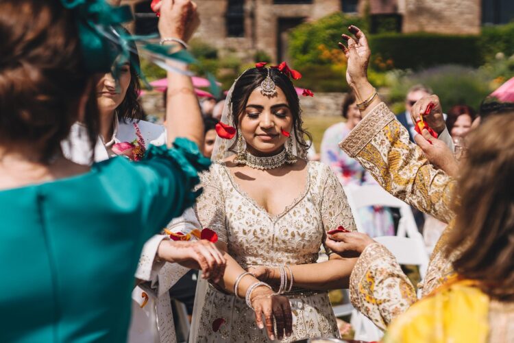 LGBTQ wedding photographer outdoor hindu wedding ceremony at How Caple Court